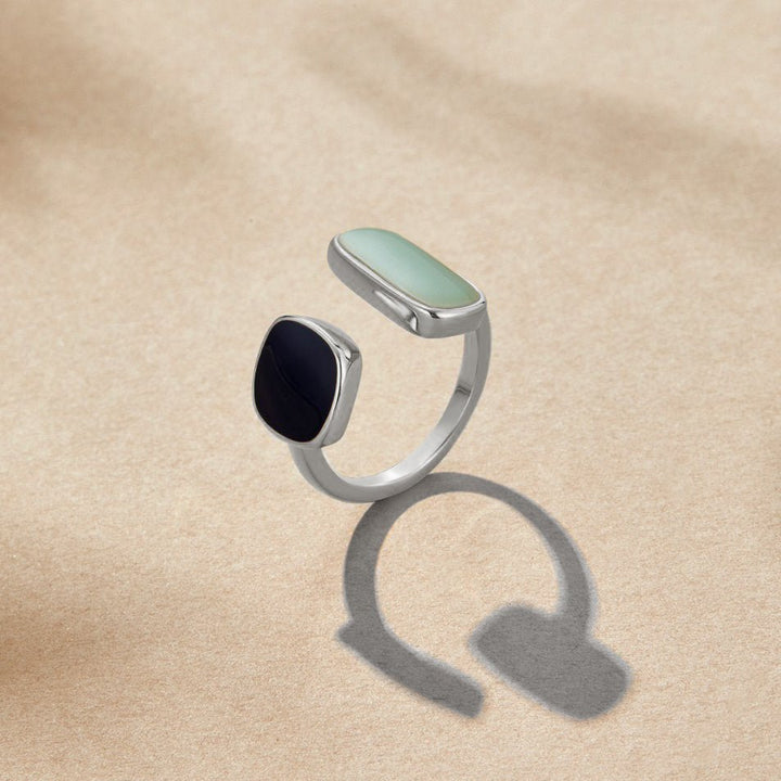 Anillo Envolvente de Acero Plateado con Aguamarina