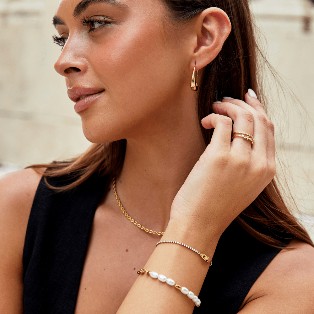 Pulsera de Cristal Blanco Niyah con Oro