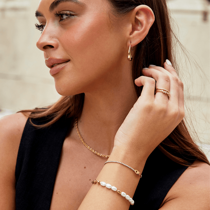 Pulsera de Cristal Blanco Niyah con Oro