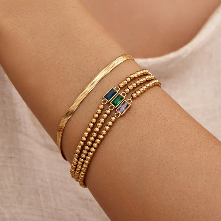 Pulsera de Piedra de Nacimiento con Perlas Doradas